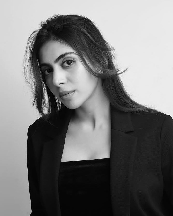 Black-and-white portrait of Simran Patil in a black blazer